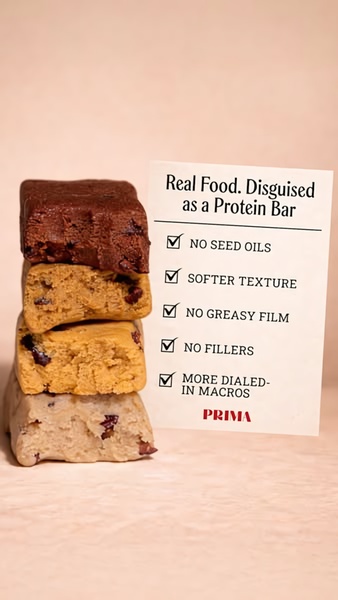 A vertical 9:16 image displaying a stack of protein bars next to a checklist that highlights key health and texture benefits.